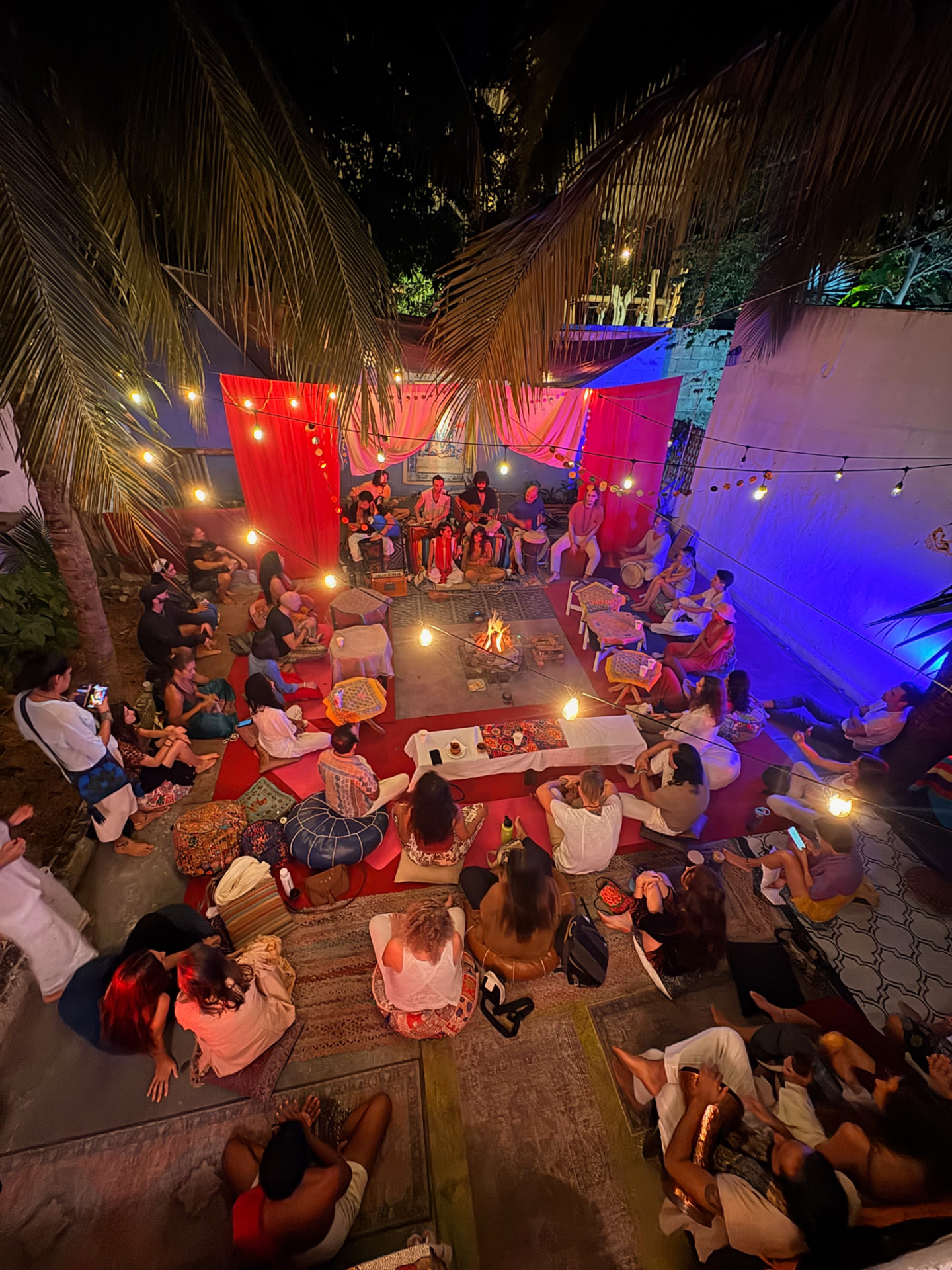 The Ganesha's Lounge community gathered around a fire for a night of music